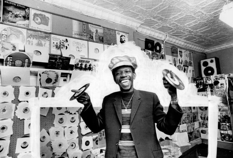 Stranger Cole, radiating playfulness and joy, spinning records on his fingers and smiling at his record store in Kensington Market in Toronto.