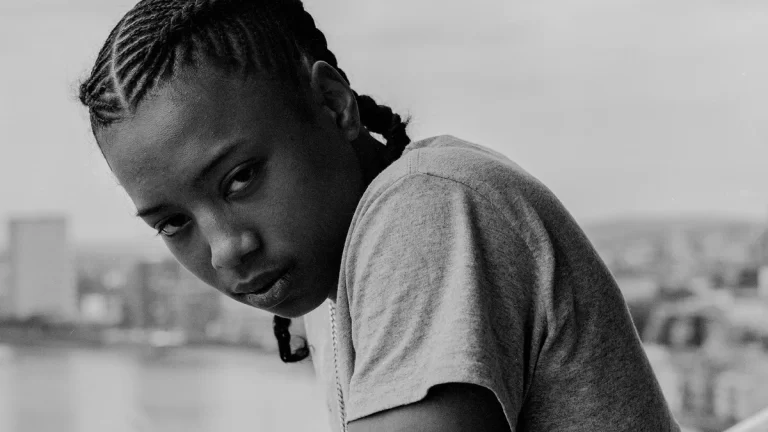 Black and white photo of Pressa on balcony