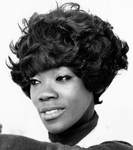 Close-up black and white photograph of Geraldine Hunt looking straight to her right