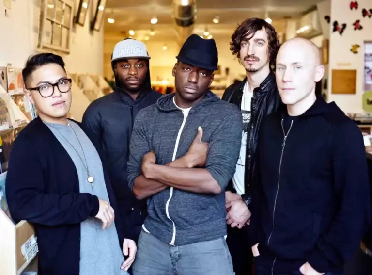 Photo of Grand Analog standing together