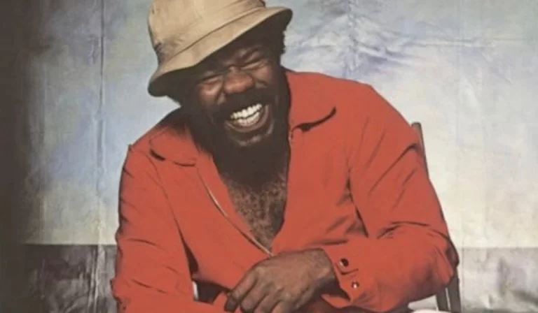 Album cover of 'Smitty", in red and smiling