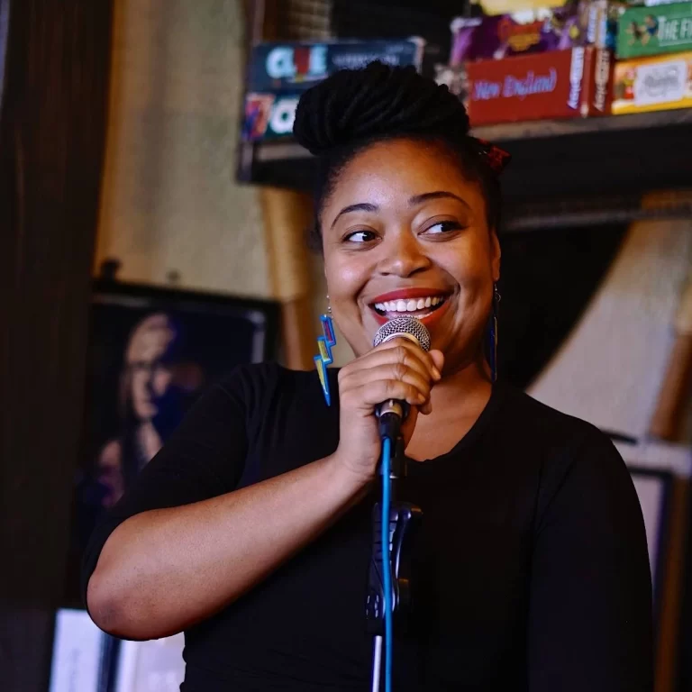 Jillian Christmas performing in a room